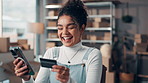 Business, credit card and woman with smartphone, boxes and smile with online shopping, app and purchase. Entrepreneur, ecommerce and happy person in workspace, cellphone and payment with password