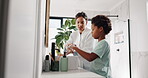 Washing, hands and mom with child, bathroom and soap for disinfection of germs, learning and hygiene. Teaching, son and bacteria prevention with water, growth or development in home, woman and boy