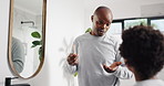 Bathroom, dad and talking to son, oral hygiene or instruction for grooming in home, learn or routine. Teaching, wellness or cleaning of mouth, black man and boy with bamboo toothbrush for dental care