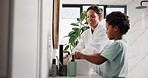 Washing, hands and mom with child, disinfection or soap for cleaning of germs, learning and hygiene. Teaching, son and bacteria prevention with water, growth or development in home, woman and boy
