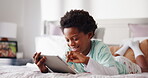 Morning, relax and tablet with black child on bed in home for browsing, online gaming or social media. App, break and smile of happy African boy in bedroom of apartment for internet streaming