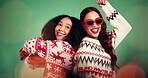 Dance, Christmas and holiday with friends in studio for season celebration, party and festive event. Happiness, xmas vacation and energy with people on green background for December, social and bokeh