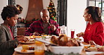 Christmas, family and eating lunch in home with children, talk and parents bonding. Xmas, father and mother with kids for food, holiday celebration and festive with hungry African siblings together