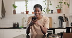 Happy, black woman or laughing with phone in kitchen for social media, chatting or texting in home. Female person, user or smile with mobile smartphone for funny message, humor or online app in house