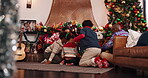 African family, excited and children for Christmas celebration, gift giving and festive season. Happy, parents and kids run for presents, xmas tradition and Santa surprise of bonding together in home