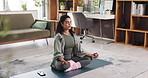 Yoga, meditation and woman in home for zen, mindfulness and holistic fitness in living room. Yogi, breathing exercise and person relax for peace, calm and spiritual practice with chakra for health