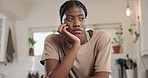 Bored, black woman and thinking in home, lonely or student with disappointment, mental health or sad. Reflection, remember and unhappy in kitchen, alone and thoughtful of college, wonder and moody