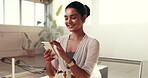 Funny, phone and pilates with woman on studio floor for break from exercise or fitness routine. App, social media and text message with person laughing in health class for communication or recovery