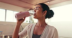 Yoga, meditation and woman with exercise, drinking water and wellness with break. Person, health center and pilates with hydration, rest and thirsty with fitness, bottle or stress relief with detox