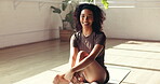 Face, wellness and yoga with woman in studio for holistic exercise, inner peace or mindfulness. Break, healing and smile with happy person on wooden floor for awareness, fitness rest or recovery