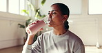 Break, drinking water and pilates with woman in studio for health, exercise or wellness. Fitness, hydration and recovery with thirsty Indian person in class for healing, holistic routine or yoga