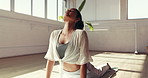 Calm woman, yoga and stretching body with mat for physical exercise, flexibility or core in studio. Active, female person or yogi with balance in cobra pose for deep breathing, mindfulness or health