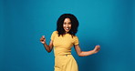 Woman, excited and face with dancing in studio, movement and goals with fashion on blue background. Girl, happy and rhythm in portrait with celebration, mock up space and confidence in Colombia