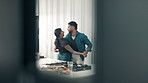 Couple, dancing and cooking in kitchen with love, bonding and happy with celebration at apartment. Man, woman and holding hands with rhythm, connection or smile for movement with relationship at home