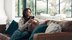Thinking, woman and communication with smartphone, home or texting with contact on social media app. Smile, person or chat with mobile in living room, reflection or typing message on website in house