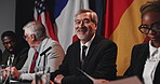Press conference, face and mature man with convention, politics and international government panel. Summit, people and politician portrait at event for diplomacy discussion, global forum or policy