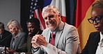 Press conference, face and mature man with delegation, politics and international government panel. Summit, people and politician portrait at event for diplomacy discussion, global forum or policy
