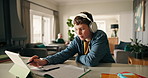 Boy, homework and tablet with e learning, book and headphones with study, math and calculator at home. Child, tech and notebook with application, notes and online course for education at house
