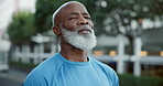 Outdoor, breathing and man with fresh air, fitness or self awareness on urban street or mindfulness. City, mature athlete and black person with morning routine for wellness, stress relief and healthy
