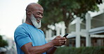 Laughing, outdoor and phone with mature black man tracking fitness goals or progress on app. Exercise, funny and mobile with happy African person in neighborhood for training or workout as runner