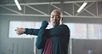 Stretching, exercise and woman in gym, wellness and balance with training, fitness and workout. Person, energy and runner in health facility, progress goals and stress relief with muscle warm up