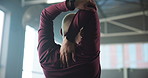 Stretching, exercise and back of woman in gym for fitness, workout and training for wellness. Sports center, morning and person with warm up for health, muscle strength or mobility for performance
