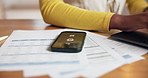 Closeup, home and woman with documents, smartphone and alarm clock for taxes deadline. Hands, apartment and person with cellphone, budget report and notification with time management and paperwork