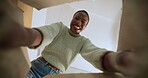 Delivery, opening box and smile of black woman in home from below for excitement or satisfaction. Face, package and shipping with happy African person in apartment for unboxing of courier parcel