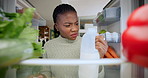 Black woman, fridge and smell with disgust at house for bad odor, expired milk and spoiled product. Pov, female person and check for rotten ingredients, forgotten diary and foul scent for food safety