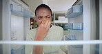 Black woman, check and fridge with disgust at house for bad odor, expired food and spoiled product. Pov, female person and smell for rotten ingredients, forgotten leftovers and foul scent for garbage