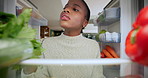 Fridge, woman and search food snack in home for hunger, muffin cheat meal and sweet craving. POV, black person and dessert decision in kitchen for refeed, healthy diet break and alternative option