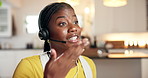 Black woman, agent and talking with headset in home for online advice or customer service. Female person, consultant or remote work with help for telecommunications or virtual assistance in house