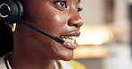 Happy, black woman and consultant mouth with headset in home for online advice or customer service. Closeup, female person or friendly agent in remote work with mic for virtual assistance in house