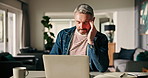 Mature man, stress and laptop with headache in home for financial mistake, expenses or bankruptcy. Male person, pain or migraine with computer, eye strain or pressure for finance or debt in house