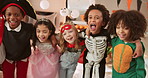 Halloween, costume party and shout with children in home for celebration, bonding and fun together. October, friends and excited kids with hug for holiday energy, vacation and festive tradition