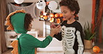 Halloween, hug and boys with high five, friends and bonding together with happiness. Kids, apartment or children in lounge, costume party or embrace with creativity, smile or fun with gesture or home