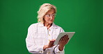 Studio, plan and woman with tablet, online or creative for design project, space and brand identity. Green background, graphic designer and mature person with tech for assignment and digital art