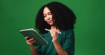 Business, thinking and woman in studio, tablet and stylus with copywriting on green background. Space, person or magazine editor with tech, typing or review with proposal, feedback or app for editing