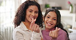 Girl, mom and face with heart fingers in home, hug or happy with bonding, care and love symbol. Woman, mother and daughter with emoji, sign and icon with smile for embrace at family house in Brazil
