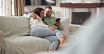 Laughing, cellphone and couple on sofa in home on mobile app for comedy, meme or funny post together. Bonding, phone and man with woman for reading online celebrity gossip in living room at house.