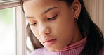 Window, thinking and sad child in home for trauma, bullying victim or mental health crisis. Face, unhappy girl and kid with reflection for depression, stress or thoughts with anxiety for mistake