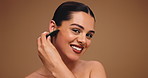 Happy woman, face or gua sha with jade for skincare, anti aging or treatment on a studio background. Portrait, female person or smile with beauty tool for spa, dermatology or facial massage on space