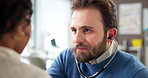 Pediatrician, stethoscope and doctor with child for consulting, medical service and appointment. Healthcare, clinic and man with kid and equipment for patient diagnosis, wellness and assessment