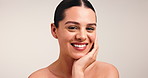 Face, dermatology and skincare with happy woman in studio for glow and health. Portrait, model and smile with cosmetics for self care with beauty, aesthetic and skin wellness on white background