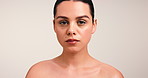 Face, makeup and woman in studio, wellness and foundation on white background. Portrait, mockup space and person with grooming, shine and glow with healthy skin, beauty and aesthetic with cosmetics