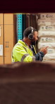 Shipping, man and dancing with headphones in warehouse for celebration, good news or fist bump. Logistics service, people or music playlist for distribution success, positive energy or work promotion