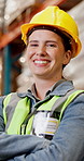 Warehouse, happy and face of woman with crossed arms for shipping, supply chain and distribution. Factory, manufacturer and portrait of person for logistics, stock supplier and ecommerce inventory