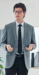 Business people, presentation and man in meeting, feedback and financial agency with planning. Investment deal, speaker and person with company mission, discussion and review revenue with speech