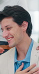 Applause, success and thank you with business man in office for achievement or milestone. Announcement, goals or target with group of excited people clapping in workplace for celebration of bonus