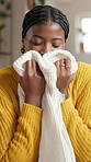 Smelling, laundry and black woman in home for housekeeping, maintenance or spring cleaning. Happy, fabric and African female person with scent on material of clothes in living room at apartment.